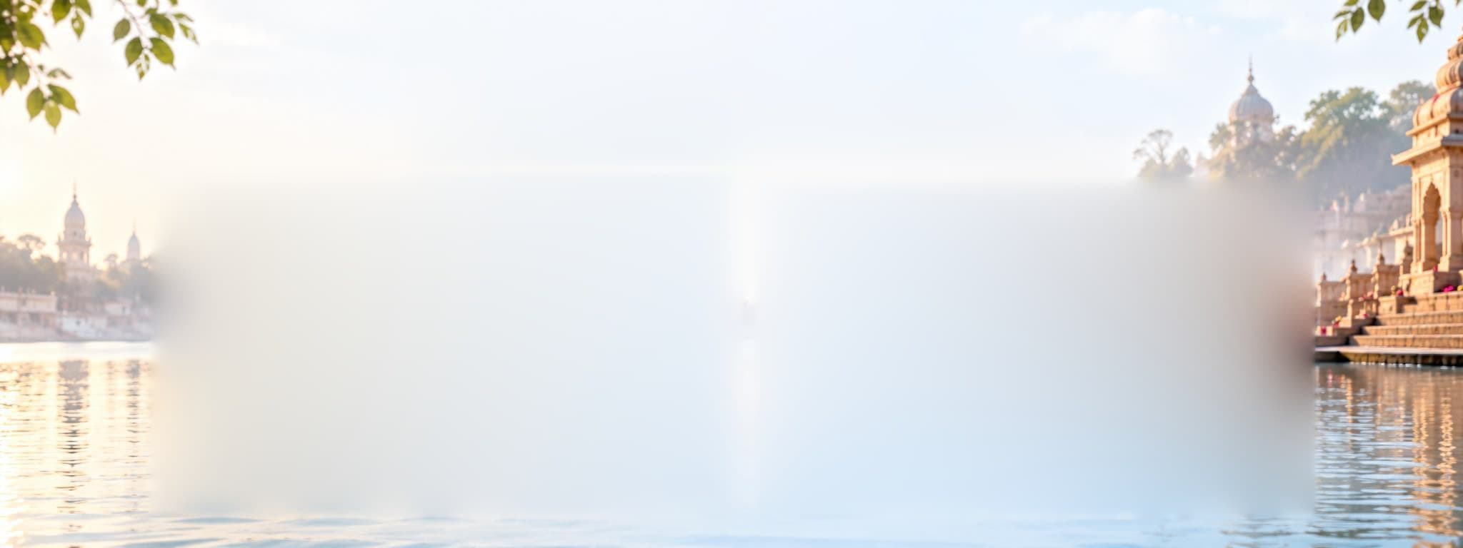 Misty sunrise over the river with temples and trees