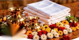 Antim sanskar samagri: white vastra, brass kalash and marigold flowers